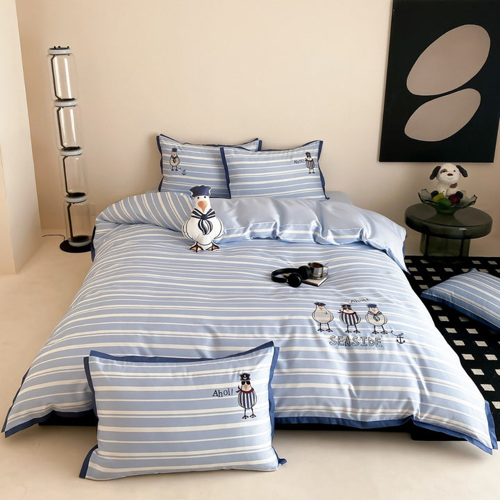 Maritime cotton satin bedding set with embroidered seagull motifs and fine stripe pattern