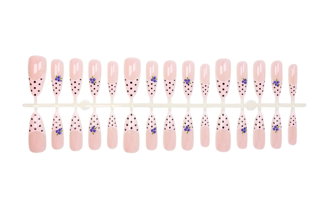Acrylic nail set with stylish dots and floral embellishments Kalsten