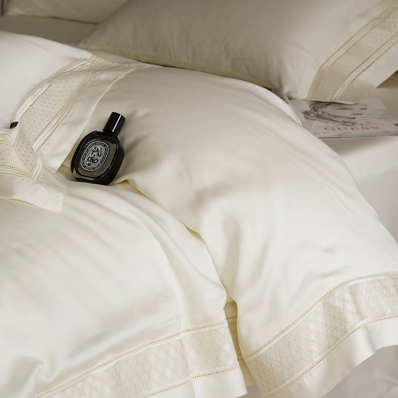Silky flowing satin bed set with decorative cassette border and extra soft touch