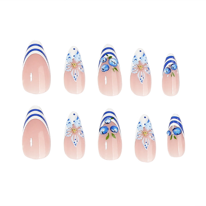Artful nail design with floral and maritime elements Kalsten