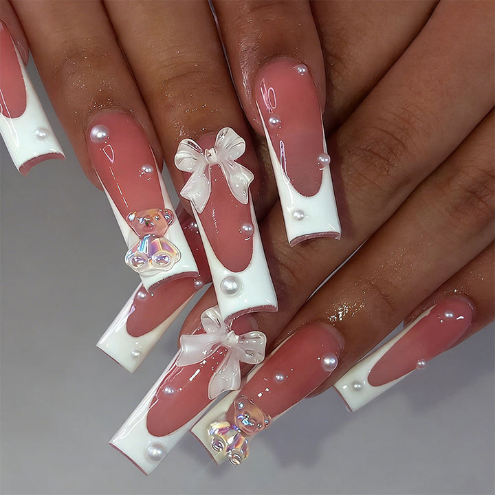 Elegant artificial nails with delicate bows and pearls Kalsten
