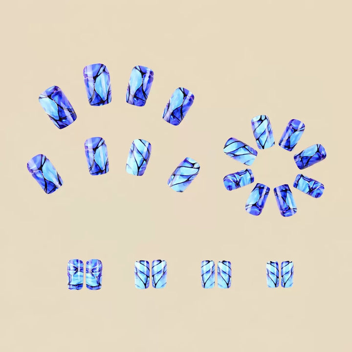 Acrylic nail set with luxurious marble design and elegant accents Kalsten
