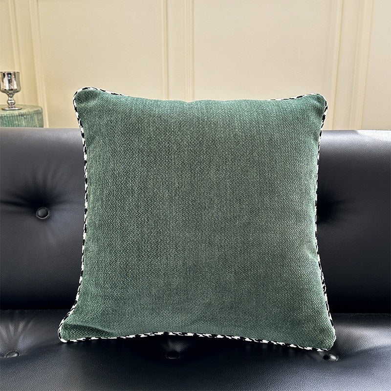 Decorative square decorative pillow made of soft velvet with contrasting piping