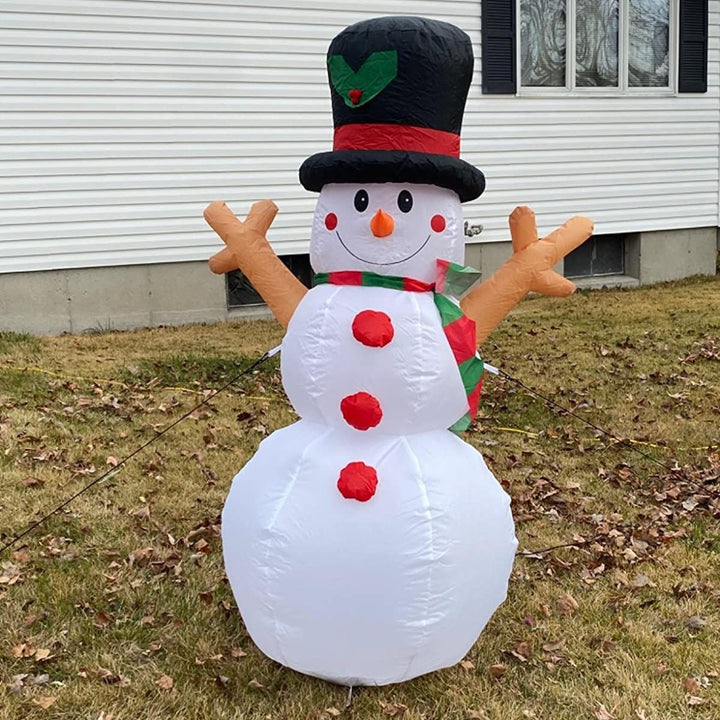 Inflatable snowman with festive decorations
