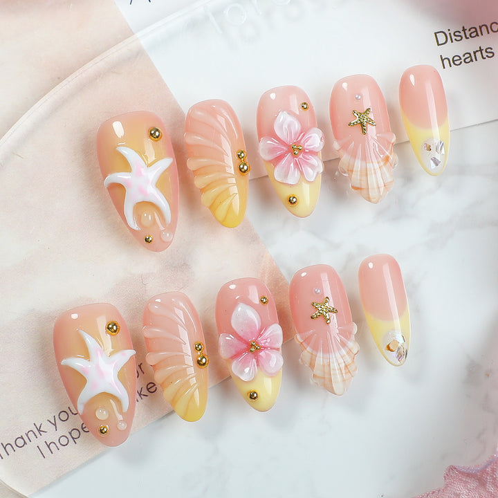 Creative nail art set with maritime motifs and elegant embellishments Kalsten