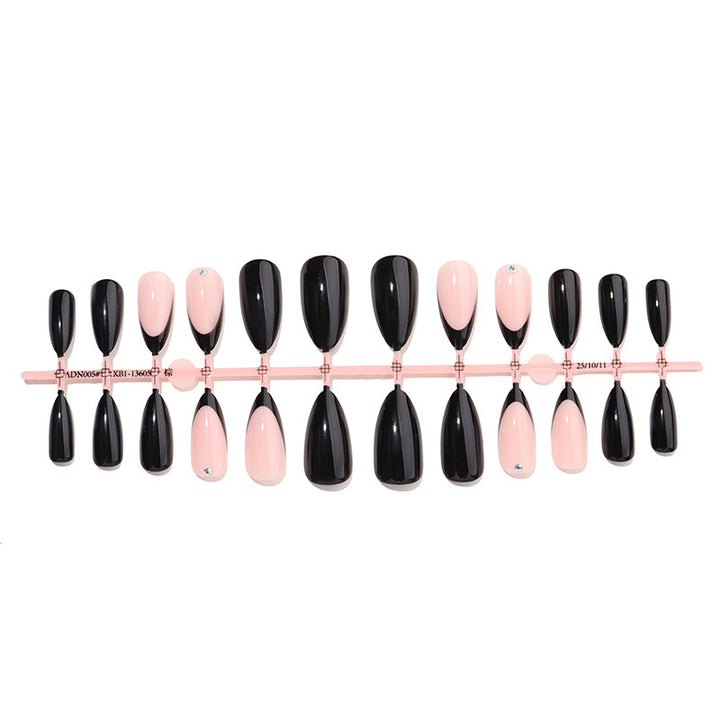 Acrylic nail set with elegant black-pink design and rhinestone-embellished accents Kalsten