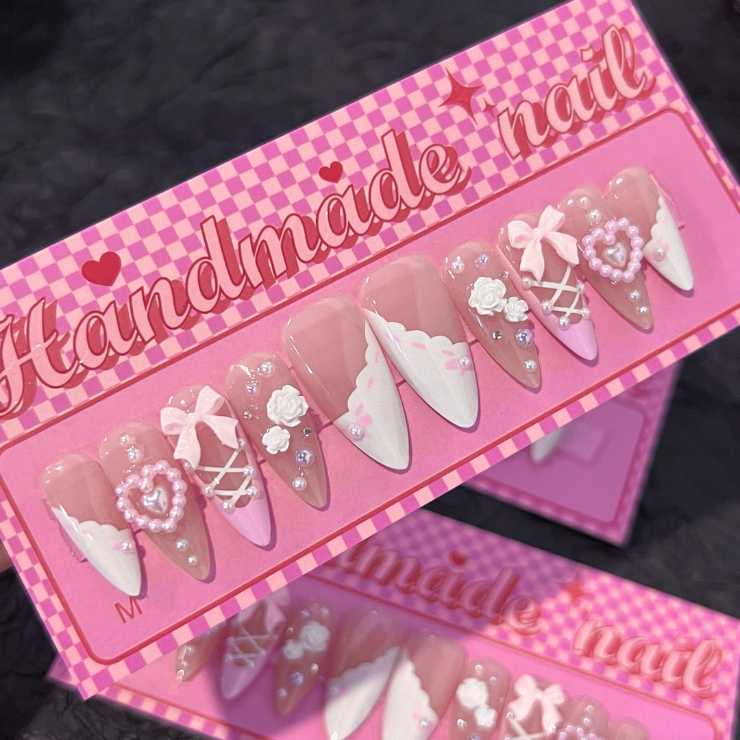 Artful stiletto nails with romantic accents Kalsten