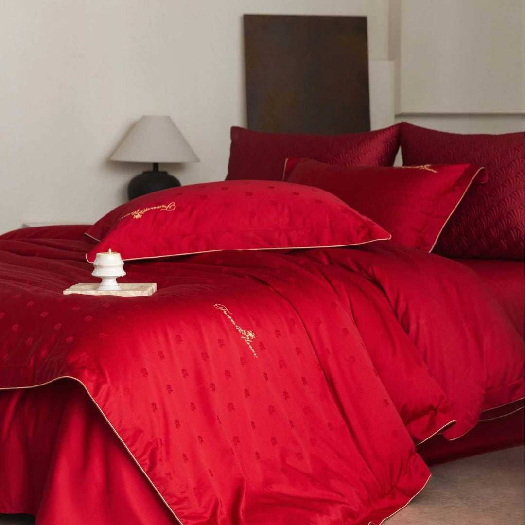 Luxurious satin bedding complete set with quilted cover and delicate logo embroidery