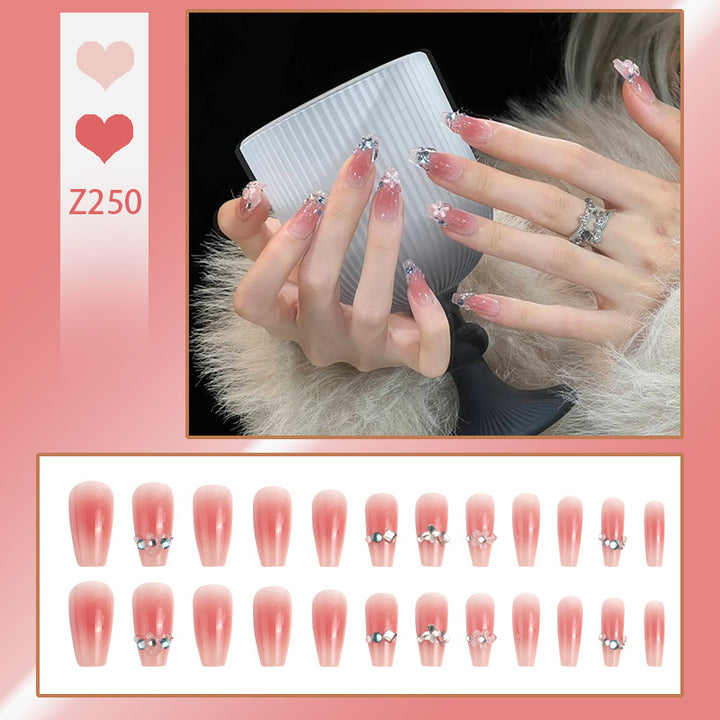 Artificial nail set with glamorous 3D decorations and shimmering accents Kalsten