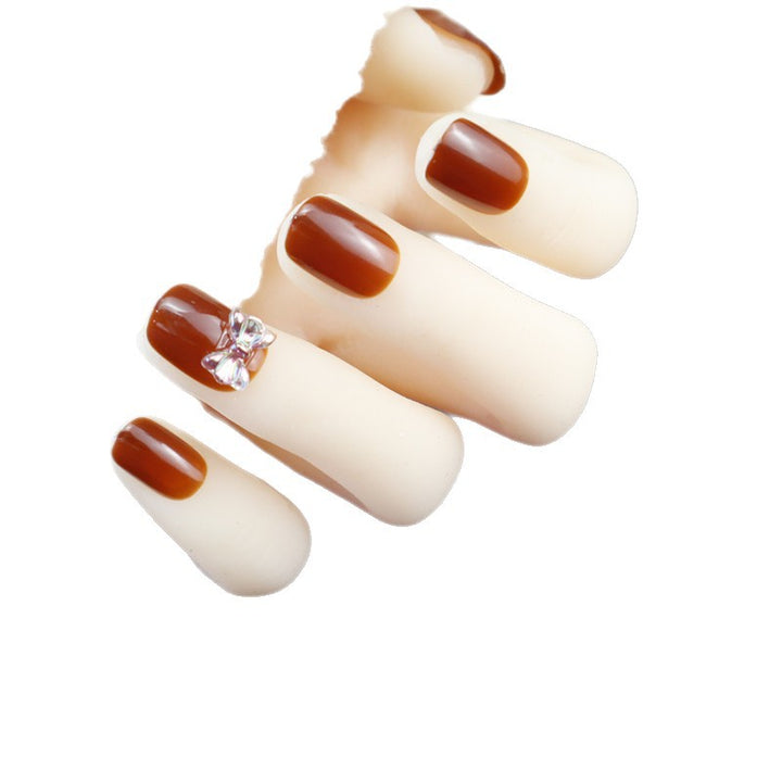 Elegant Press-On Nail Design with Rhinestone Accent