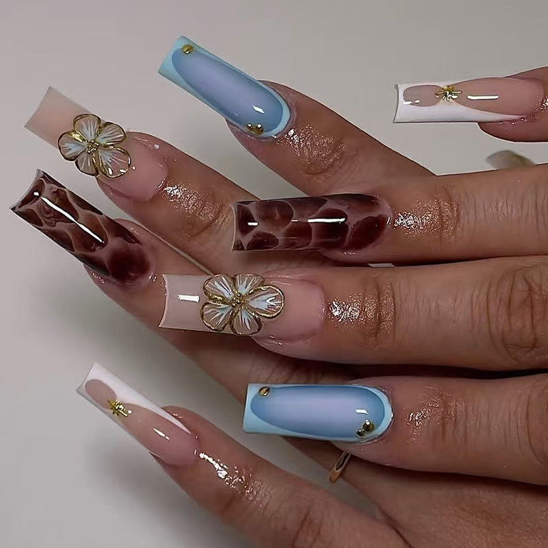 Artistic Press-On Nail Set with Floral Embellishments