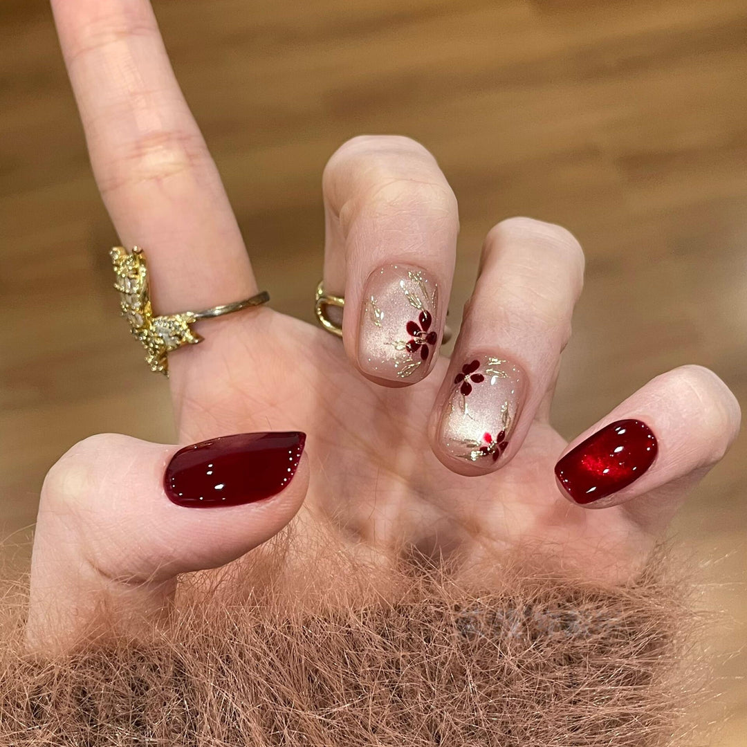 Artificial nails with elegant floral and glitter designs Kalsten