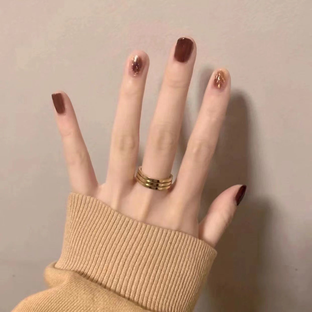 Artistic Press-On Nail Set with Gold Accents