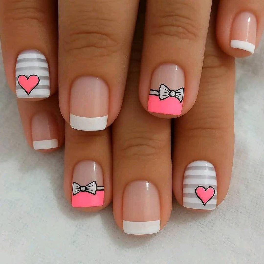 Artificial nails with playful heart and bow pattern Kalsten
