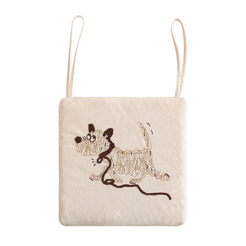 Padded seat cushion with embroidered dog motif and ties Kalsten