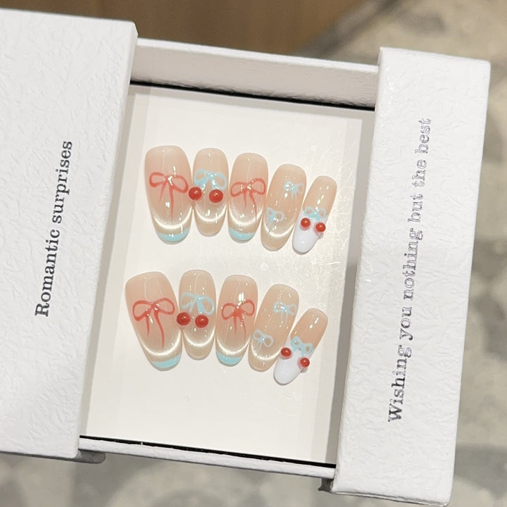 Artificial nail tips with romantic bow and cherry motifs Kalsten