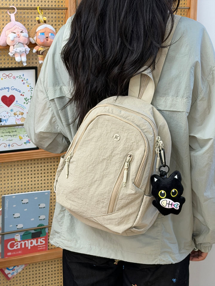 Textured Canvas Sling Backpack
