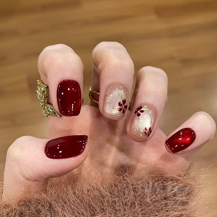 Artificial nails with elegant floral and glitter designs Kalsten