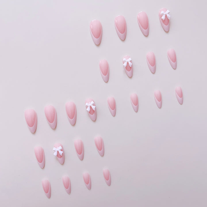 Artificial nail set with elegant tips and delicate bow decorations Kalsten