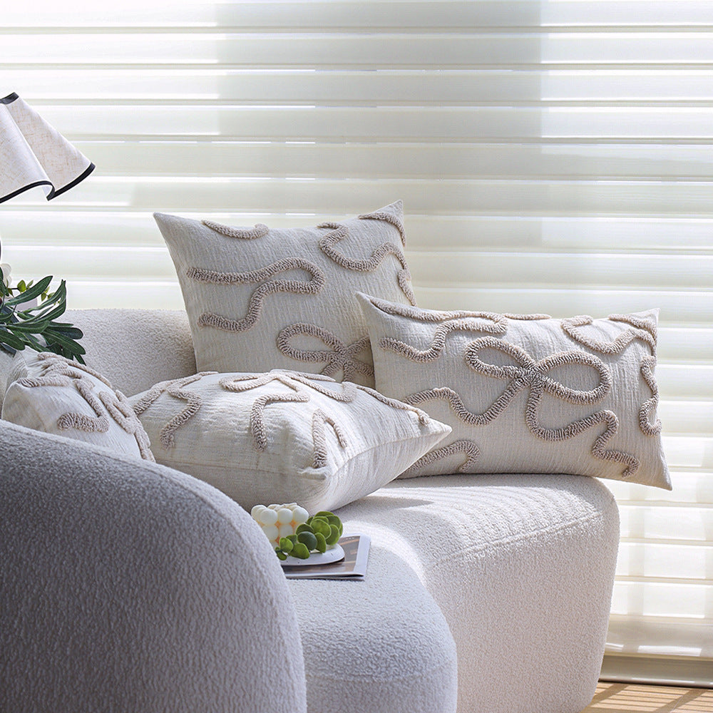 Square decorative cushion cover with hand-tufted bow and wave relief made of cotton-linen mix Kalsten