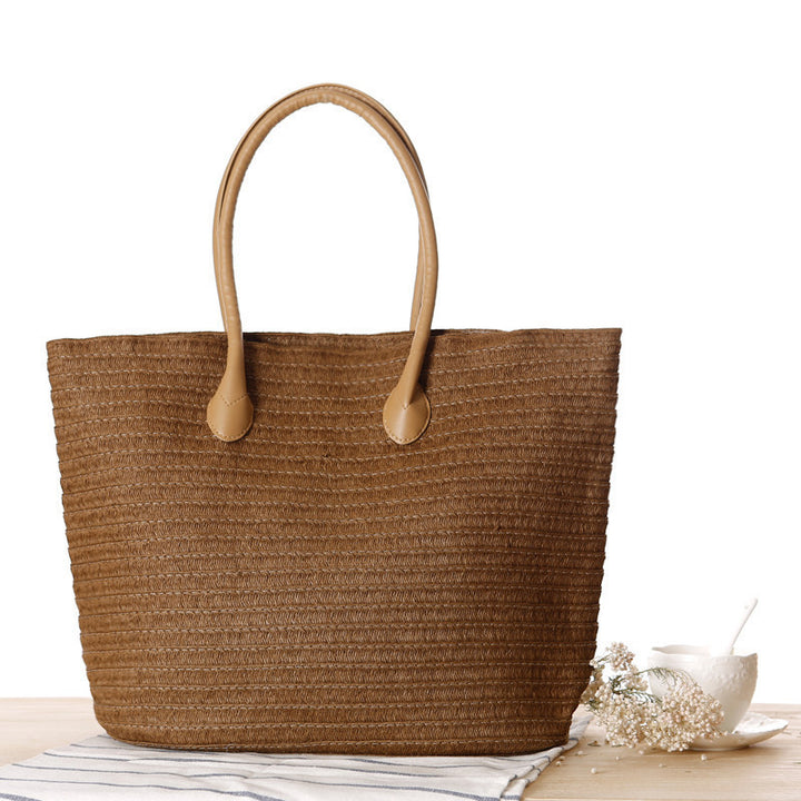 Spacious straw shopper with leather carrying handles Kalsten