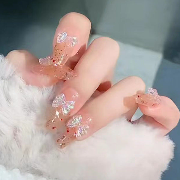 Glamorous artificial nails with delicate flower and glitter effects Kalsten
