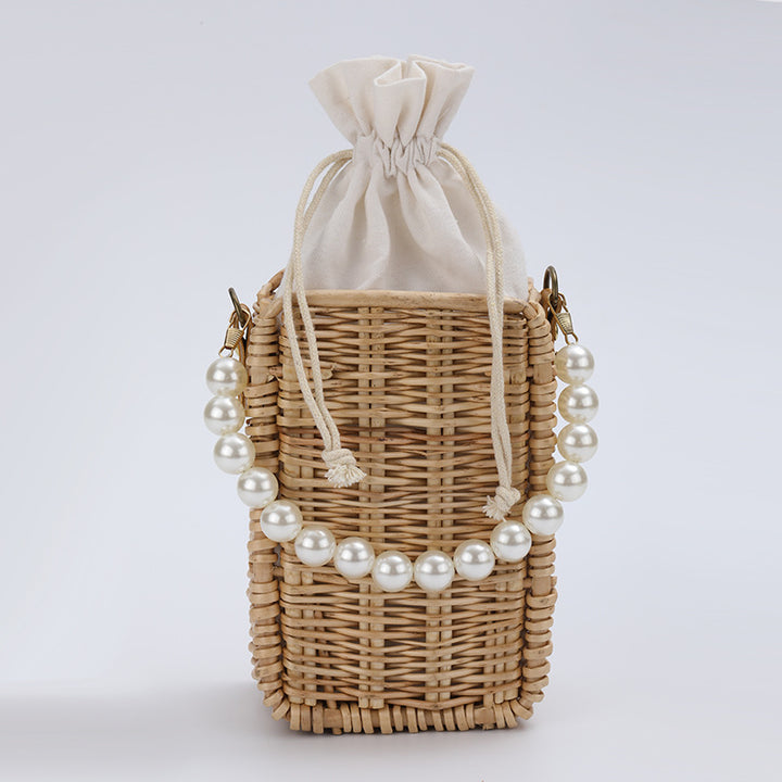 Women's handbag made of woven material with pearl accents Kalsten
