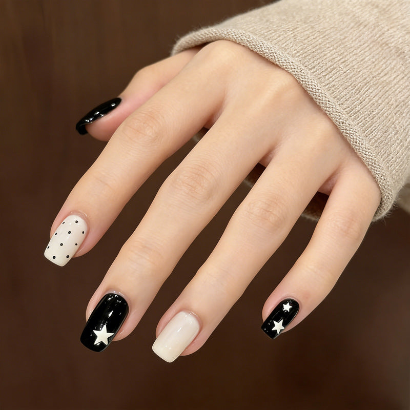 Artistic Press-On Nail Design with Stars and Polka Dots Kalsten