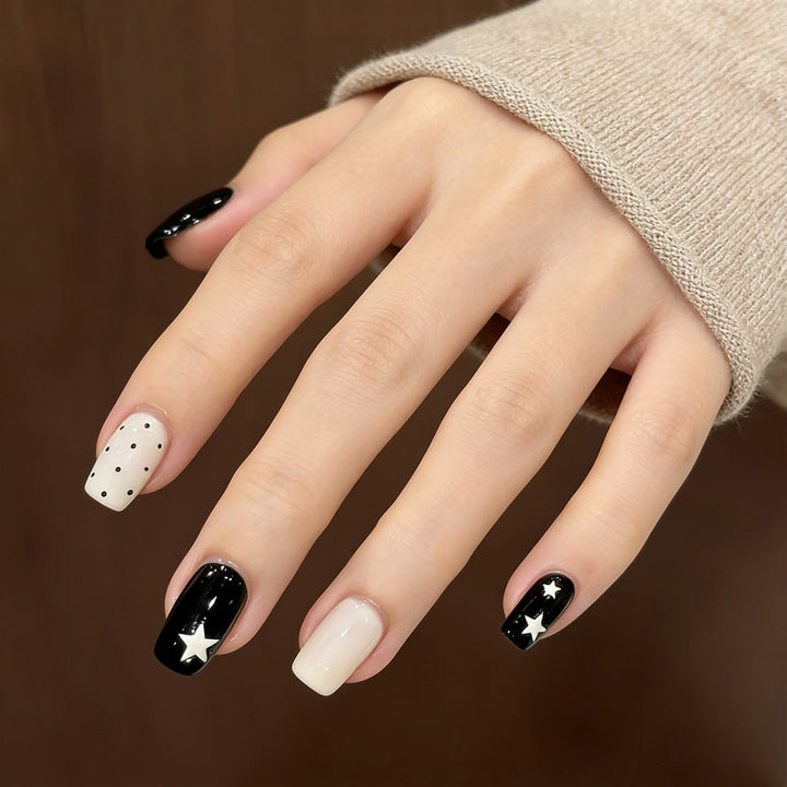 Artistic Press-On Nail Design with Stars and Polka Dots Kalsten