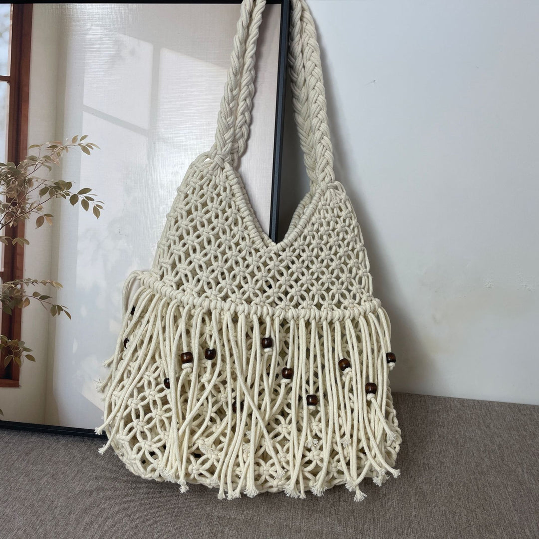 Macramé bag with long fringes and wooden beads Kalsten