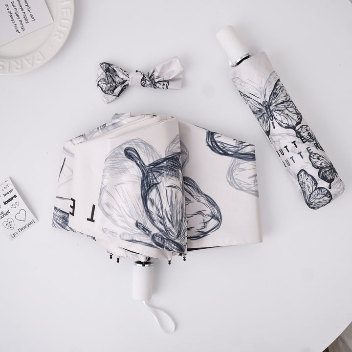 Ladies innovative folding umbrella with gentle leaf design and practical carrying pouch Kalsten