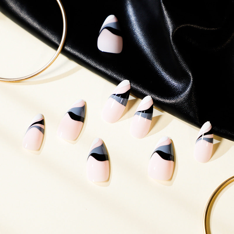Artful nail extensions with creative wave pattern Kalsten
