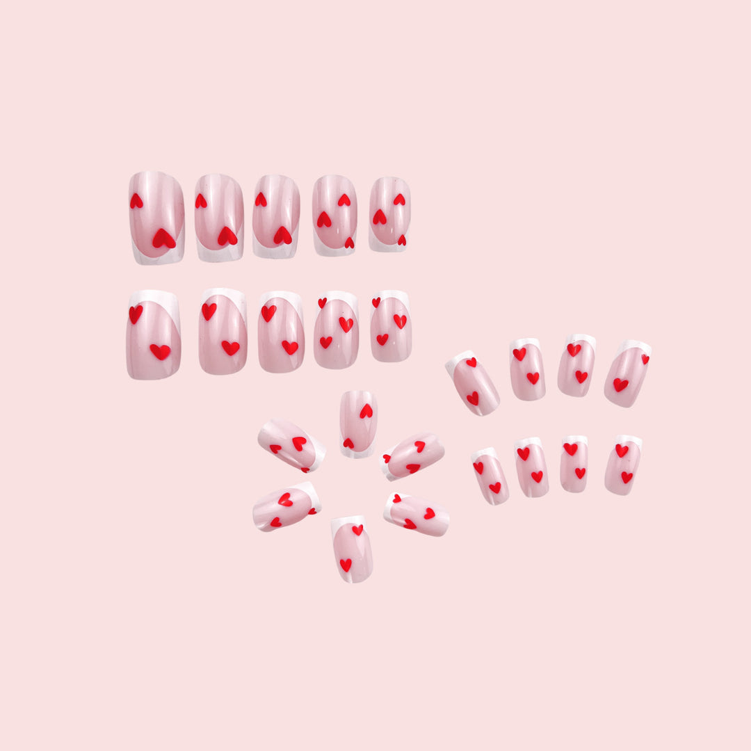 Heart-Embellished French Tip Nail Art Kalsten