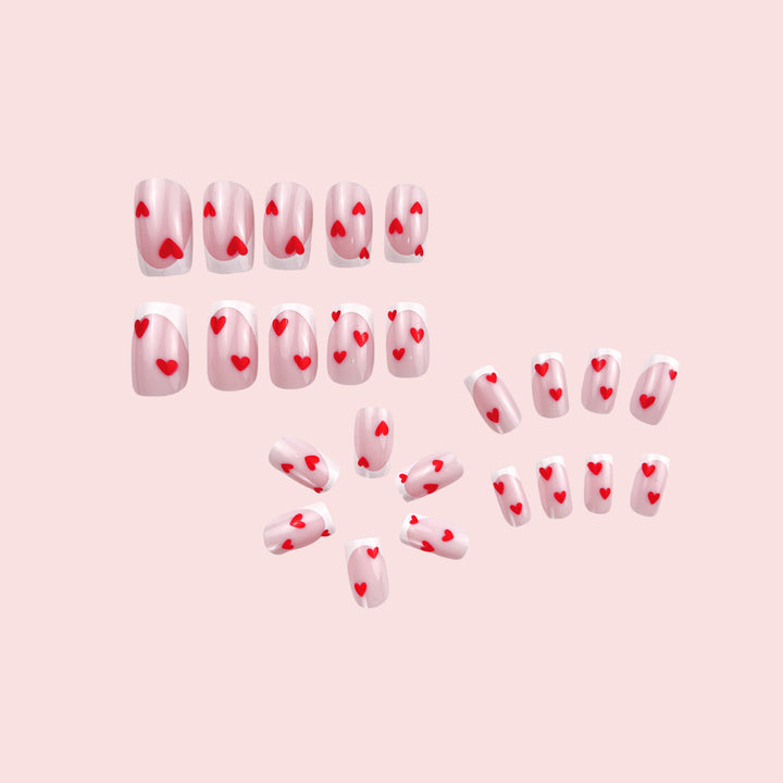 Heart-Embellished French Tip Nail Art Kalsten