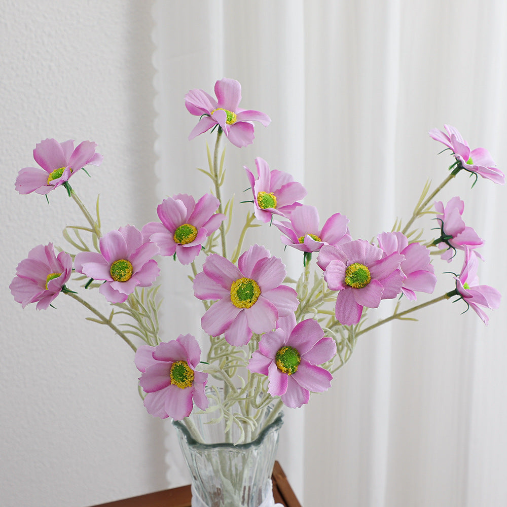 Elegant artificial flower bouquet with intricately detailed blooms