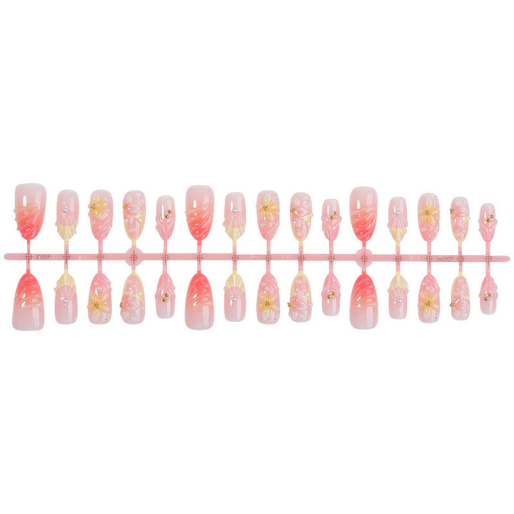 Elegant artificial nail set with floral and glamorous accents Kalsten