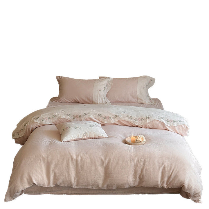 Bedding set made of washed linen with floral embroidery border