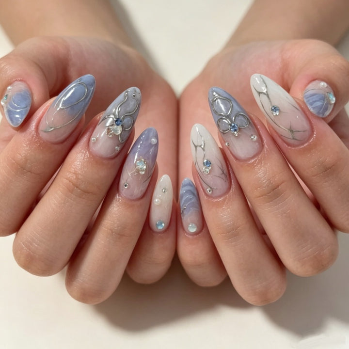 Artistic Press-On Nail Design with Floral and Gem Accents Kalsten