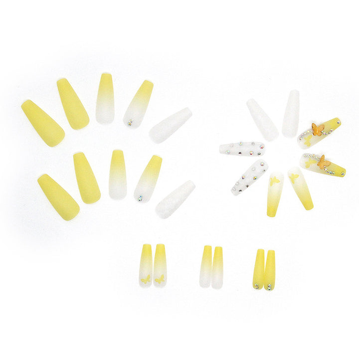 Artificial nail extensions with floral accents and rhinestones Kalsten