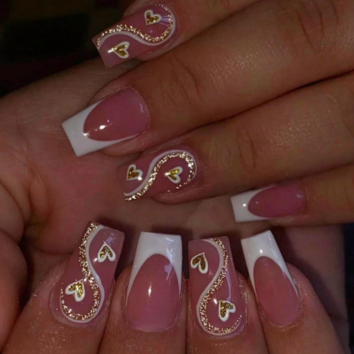 Artificial nail set with elegant heart decorations and glitter accents Kalsten