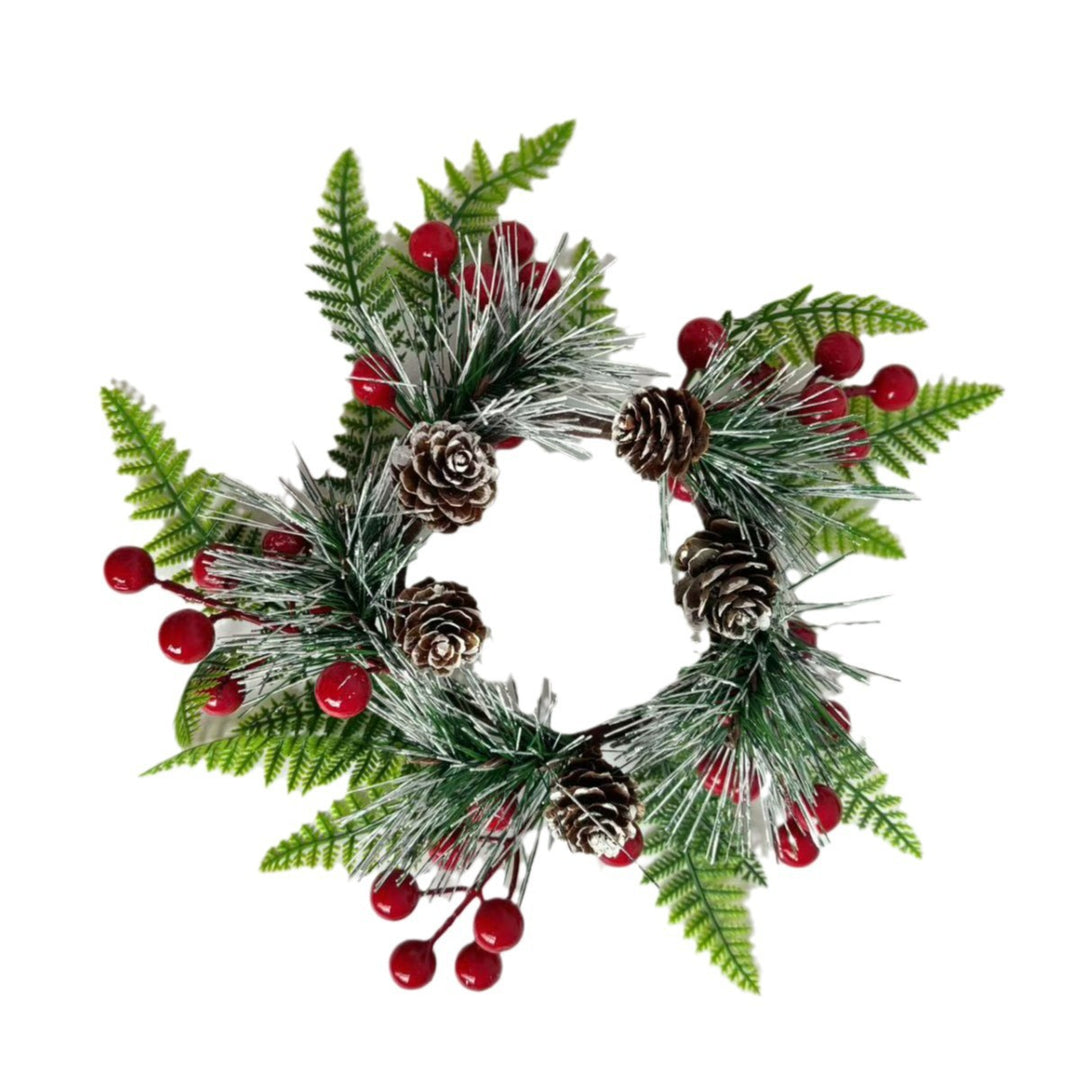 Christmas wreath with pine cones and red berries
