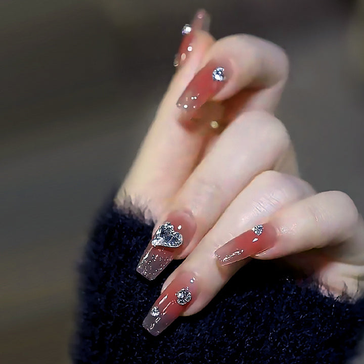 Acrylic nail set with elegant heart and rhinestone decorations Kalsten