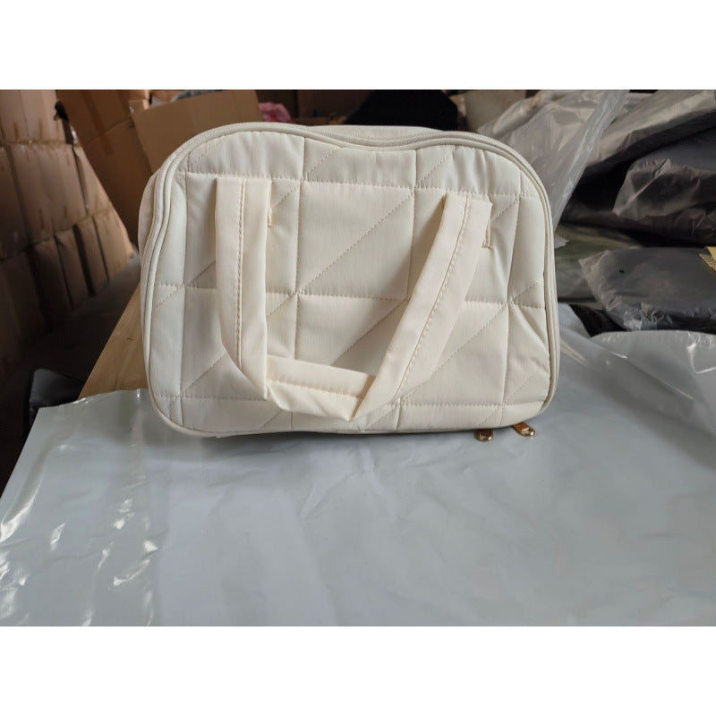 Cosmetic bag with padded interior compartment Kalsten