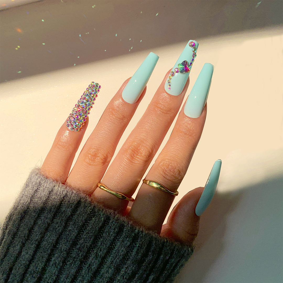 Glamorous artificial nails with sparkling rhinestone embellishments Kalsten