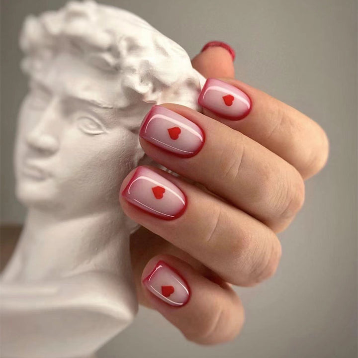Nail art with romantic heart motifs Kalsten