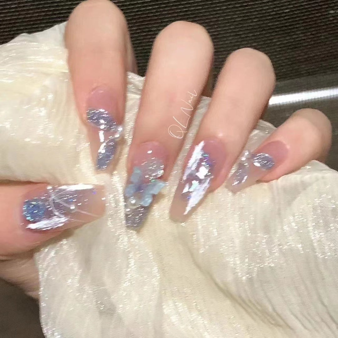Artistic 3D nail extensions with glitter accents Kalsten