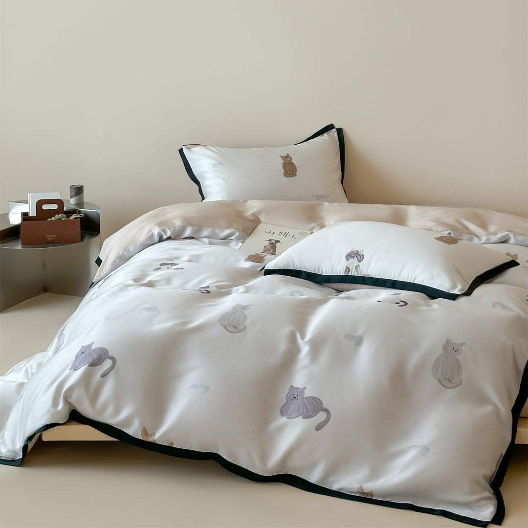 Luxurious satin bedding set with floral watercolor print, ruffled edges and reversible function