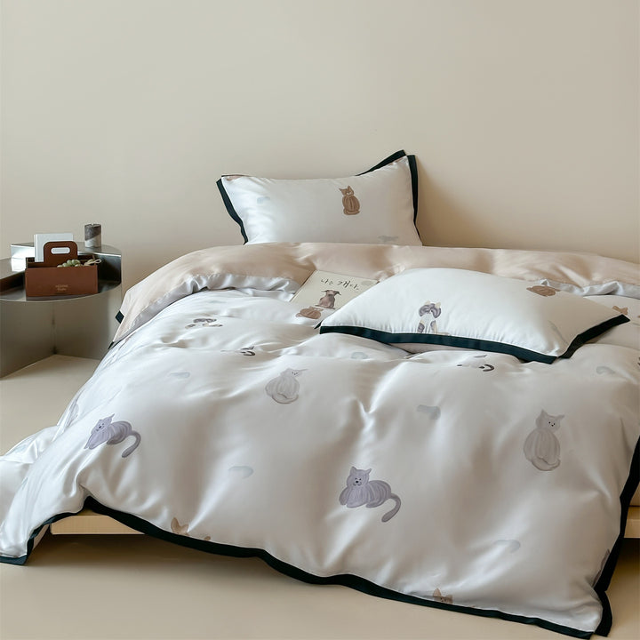 Luxurious satin bedding set with floral watercolor print, ruffled edges and reversible function