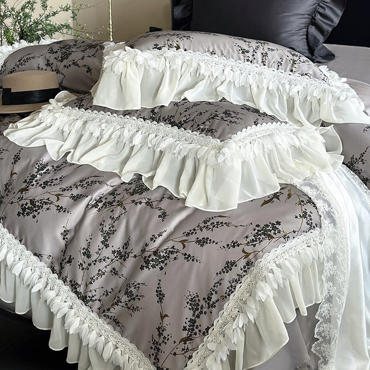 Satin bedding set with floral print duvet, tiered ruffle pillow & lace trim
