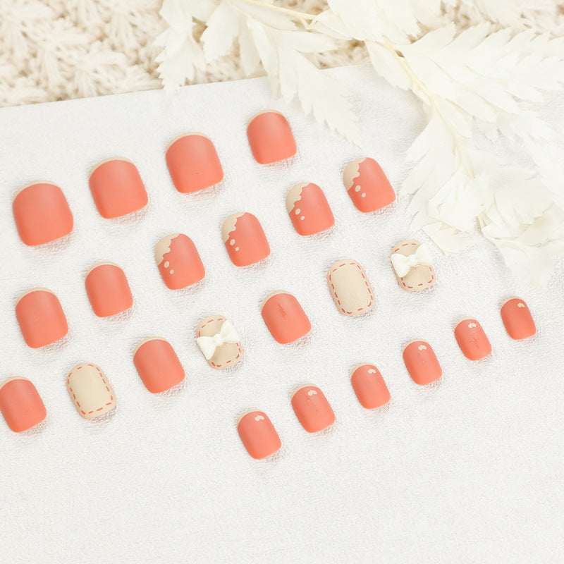 Artistic nail nails with decorative bow designs and French tips Kalsten